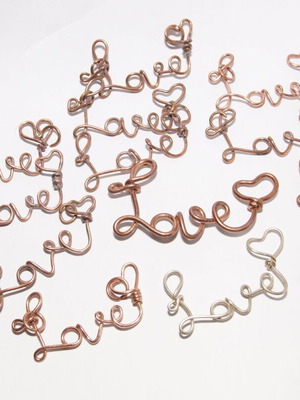 Handmade metal love pendants used, pack of 13 pieces