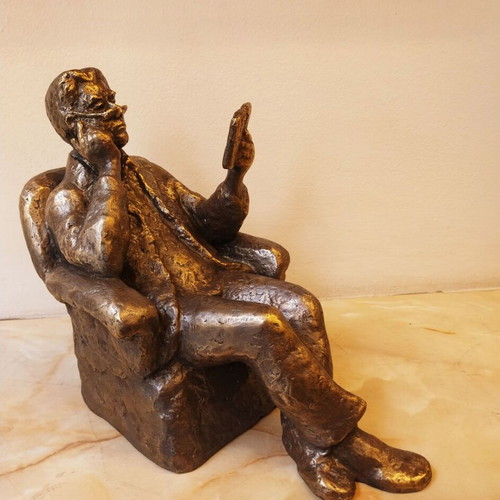 Sculpture of a Man Reading a Book, New