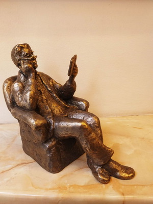 Sculpture of a Man Reading a Book, New