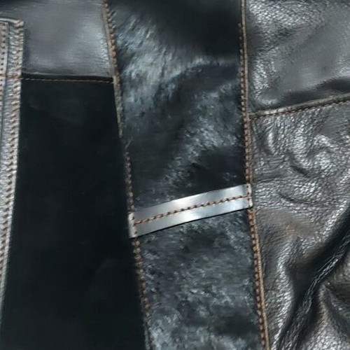 Mandarina Duck leather bag black like new with castor and pony skin