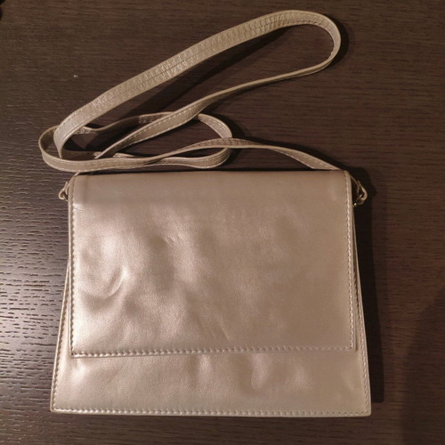 Evening handbag hand-held like new, gold color