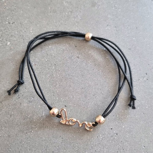 Love bracelet new with adjustable black and gold elastic