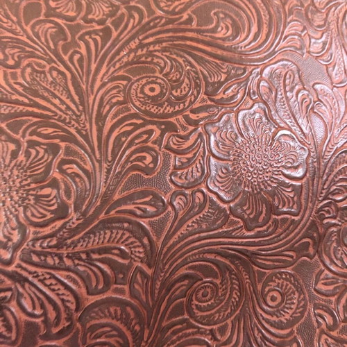 Women's brown shoulder bag used with embossed design