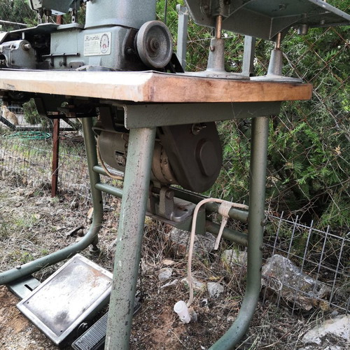 Sewing machines used with complete table