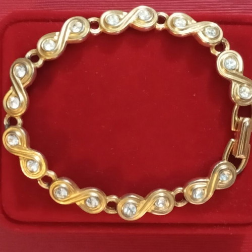 Swarovski infinity crystal bracelet faux vintage used, wrist size 18cm
