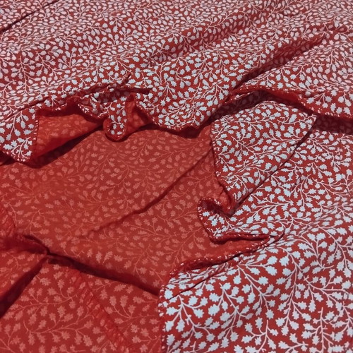 Midi asymmetrical skirt like new, red with small floral print, size M