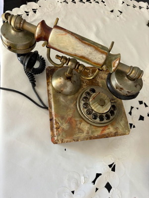 Antique rotary phone used with nephrite