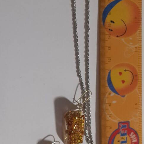 Set of 9 handmade resin pendant and earring jewelry sets, multicolor