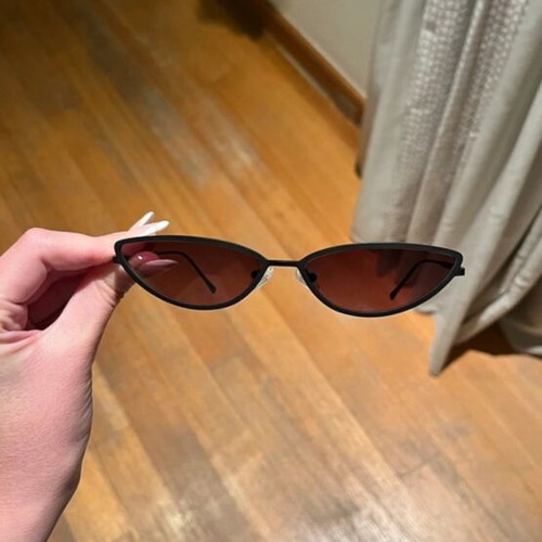 Sunglasses new with thin black frame and pink lens