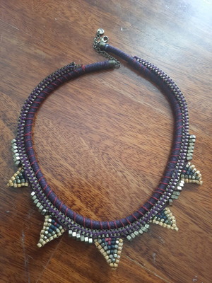 Necklace with beads and cord in blue and burgundy with gold details new