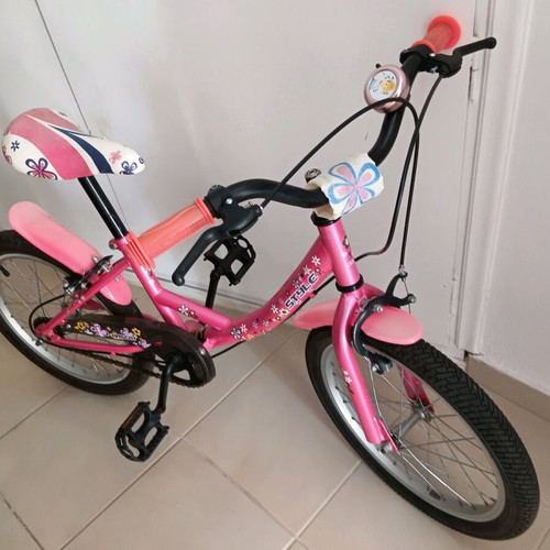 Girl's City Bicycle pink with designs like new, includes training wheels