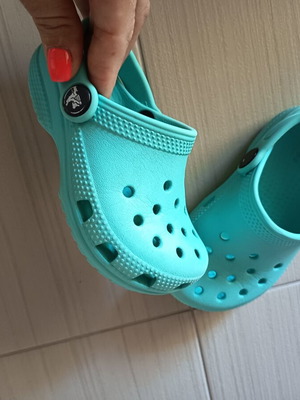 Crocs sandals size C8 like new, neutral turquoise color