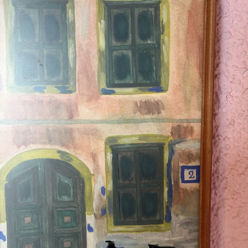 Painting of traditional building facade with arched entrance