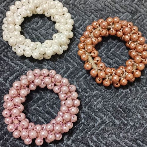 Hair ties new with beads in three colors