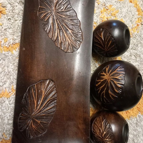 Plate with three wooden candlesticks used