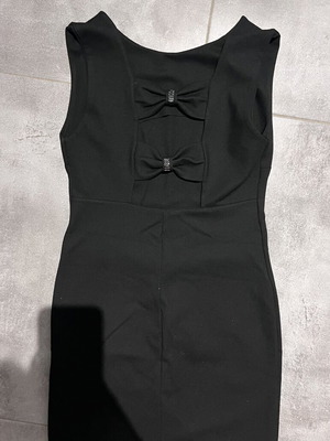 Black mini dress with bows and strass on back, like new