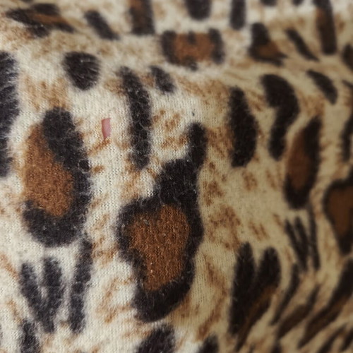 Sofa throw used with small hole
