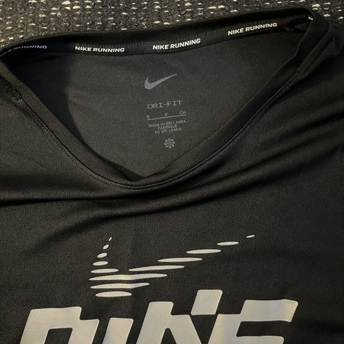 Nike running shirt like new, size small, black and white