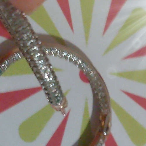 Gold hoop earrings with zircon stones