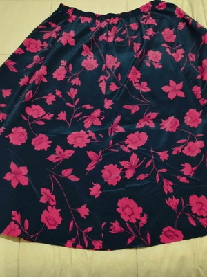 Skirt black shiny with red flowers new