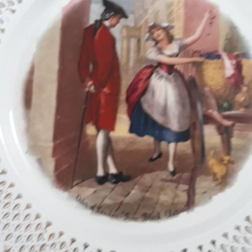 Set of four used French wall plates with gold designs 23cm
