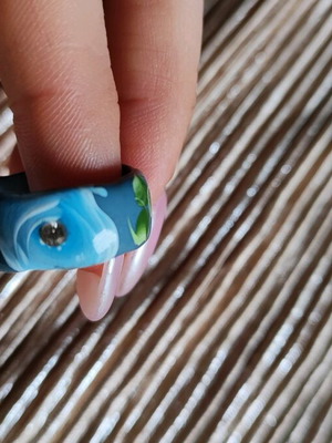 Blue painted bone ring used with rhinestone