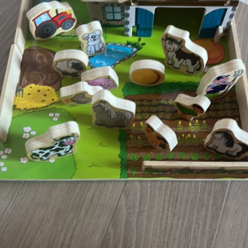 Wooden farm playset with 31 pieces in like new condition