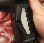PlayStation controller used, somewhat worn but functional