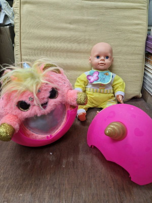 Baby doll and plush with egg in excellent condition
