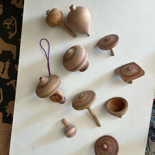 Wooden spinning tops like new