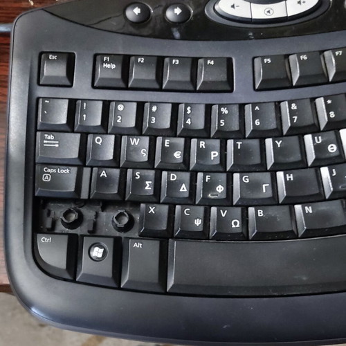 Microsoft computer keyboard used with two missing keys