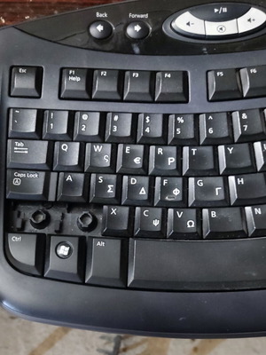 Microsoft computer keyboard used with two missing keys
