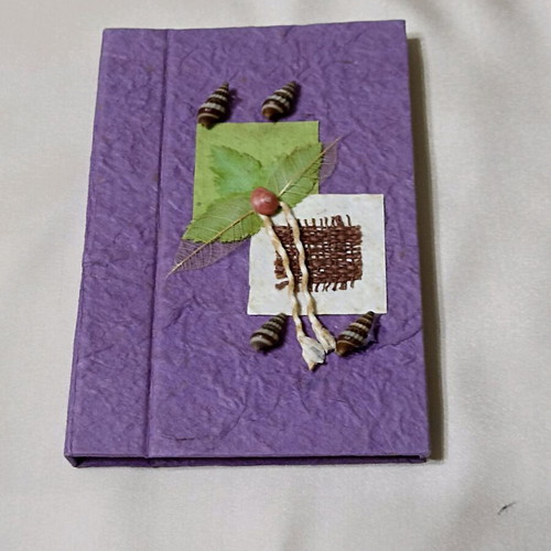 Decorative notepad with index used, purple, natural paper