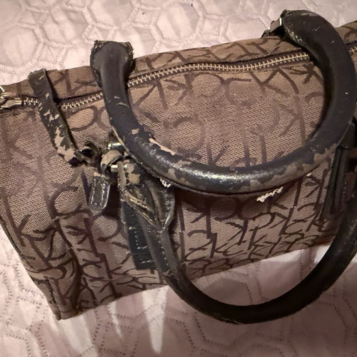 Calvin Klein CK bag used with worn leather repairable