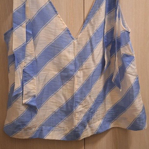 H&M top with shoulder ties and V neckline, size 46, like new, white and blue