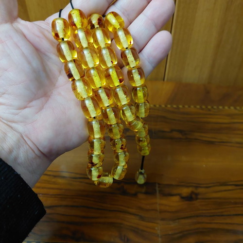 Komboloi made of high-quality resin, new, 33+4 beads amber color