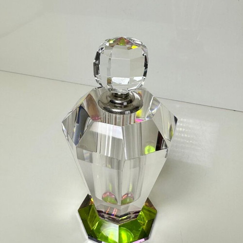 Vintage faceted crystal perfume bottle with iridescent prism base