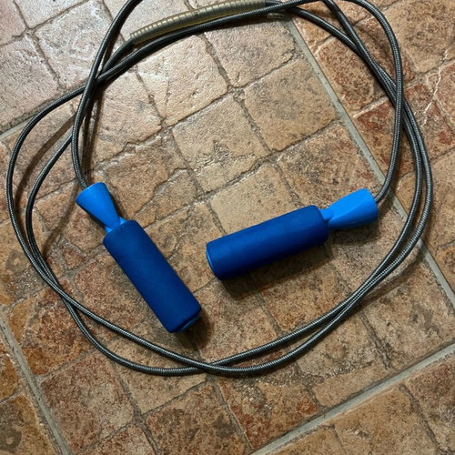 Fitness jump rope like new with soft handles and plastic protector