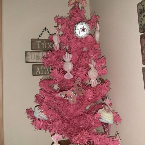 Small Christmas tree with ornaments like new