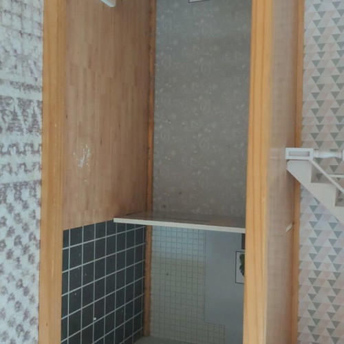Wooden dollhouse used, 3 levels with stairs and decoration
