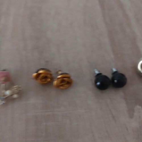 Set of four pairs of earrings like new, black and gold
