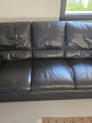 Leather three-seater sofa