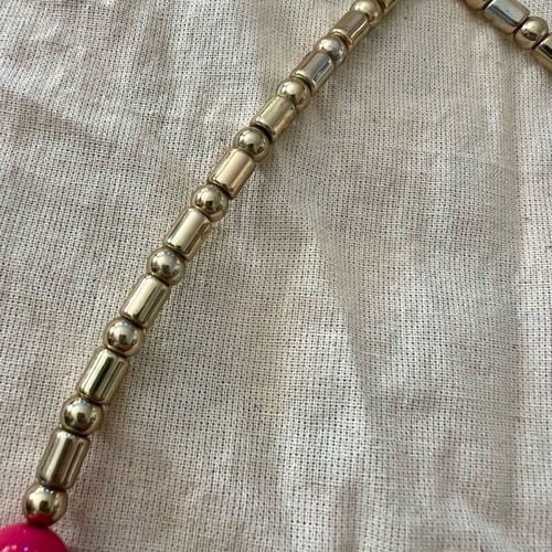 Statement necklace with large beads used, purple and gold details