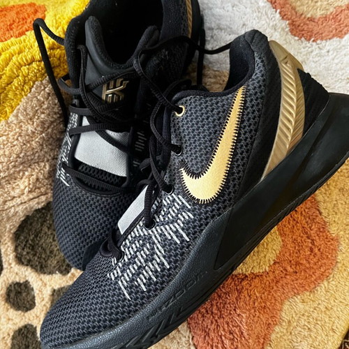 Nike athletic shoes size 42.5 used, black and gold