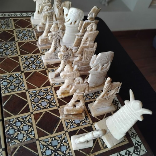 Handmade chess with mother-of-pearl and ancient Egyptian figures used