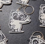 Pug keychain with middle finger gesture