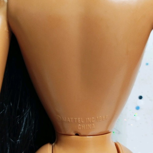 Pocahontas doll by Mattel used with flaws