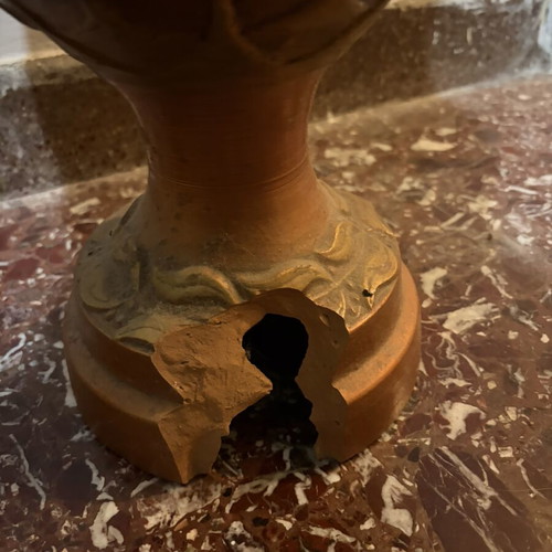 Antique amphora used with a break at the bottom