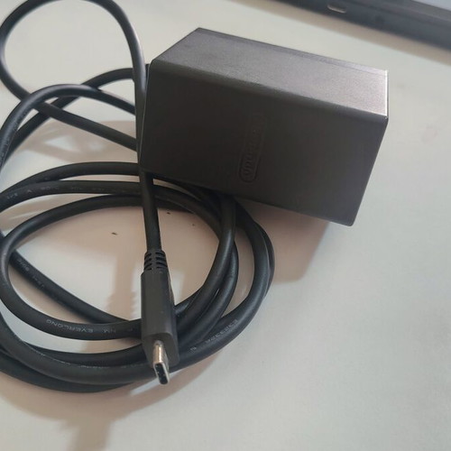 Nintendo Switch console with accessories and carrying case