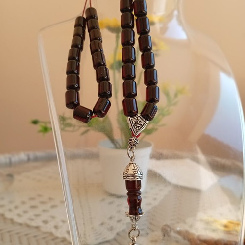 Komboloi worry beads, 33 black cherry mastic beads